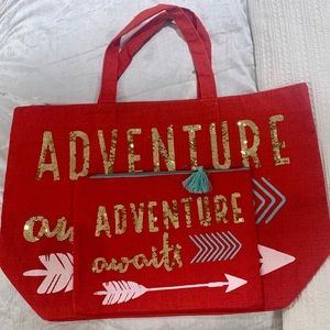 Fun red tote bag. "Adventure Awaits"